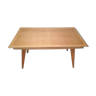 Dining table with compass feet