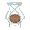 Canned chair with wooden and metal braces
