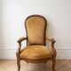 Louis XV armchair in wood and yellow fabric