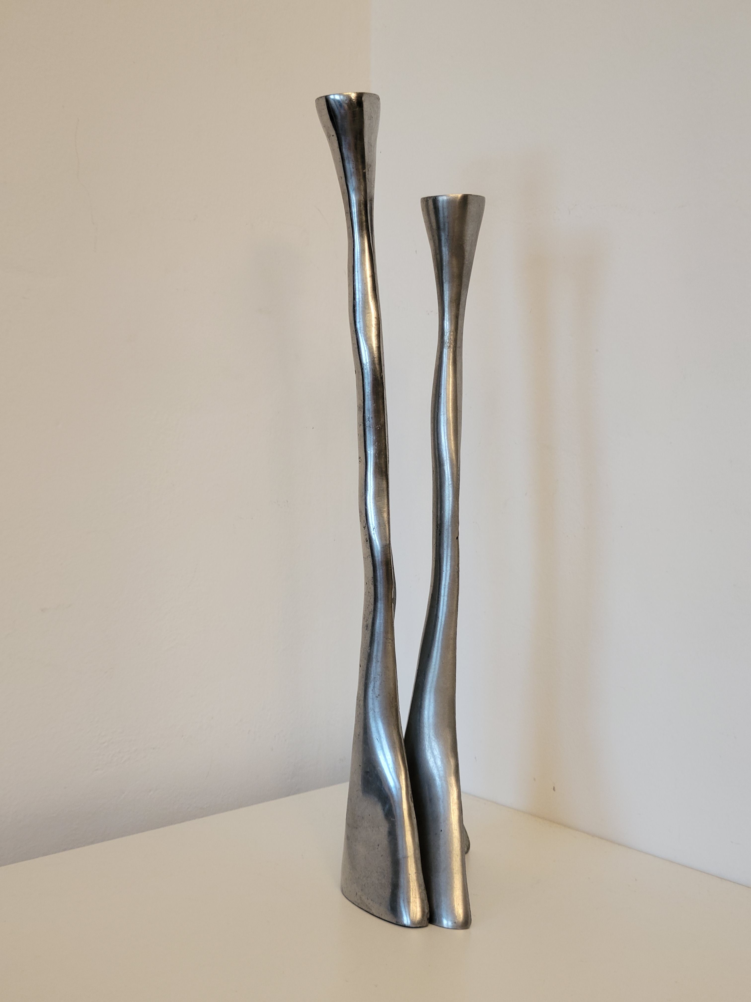 Pair of brutalist metal candlesticks in organic shape sleek design