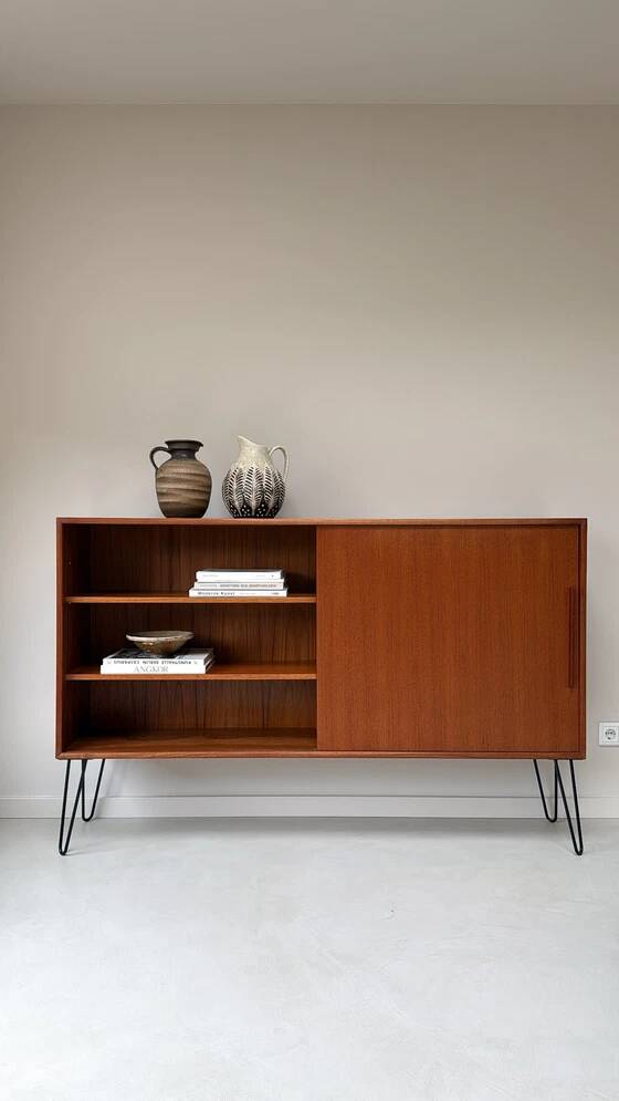 Vintage wooden sideboard with sliding door