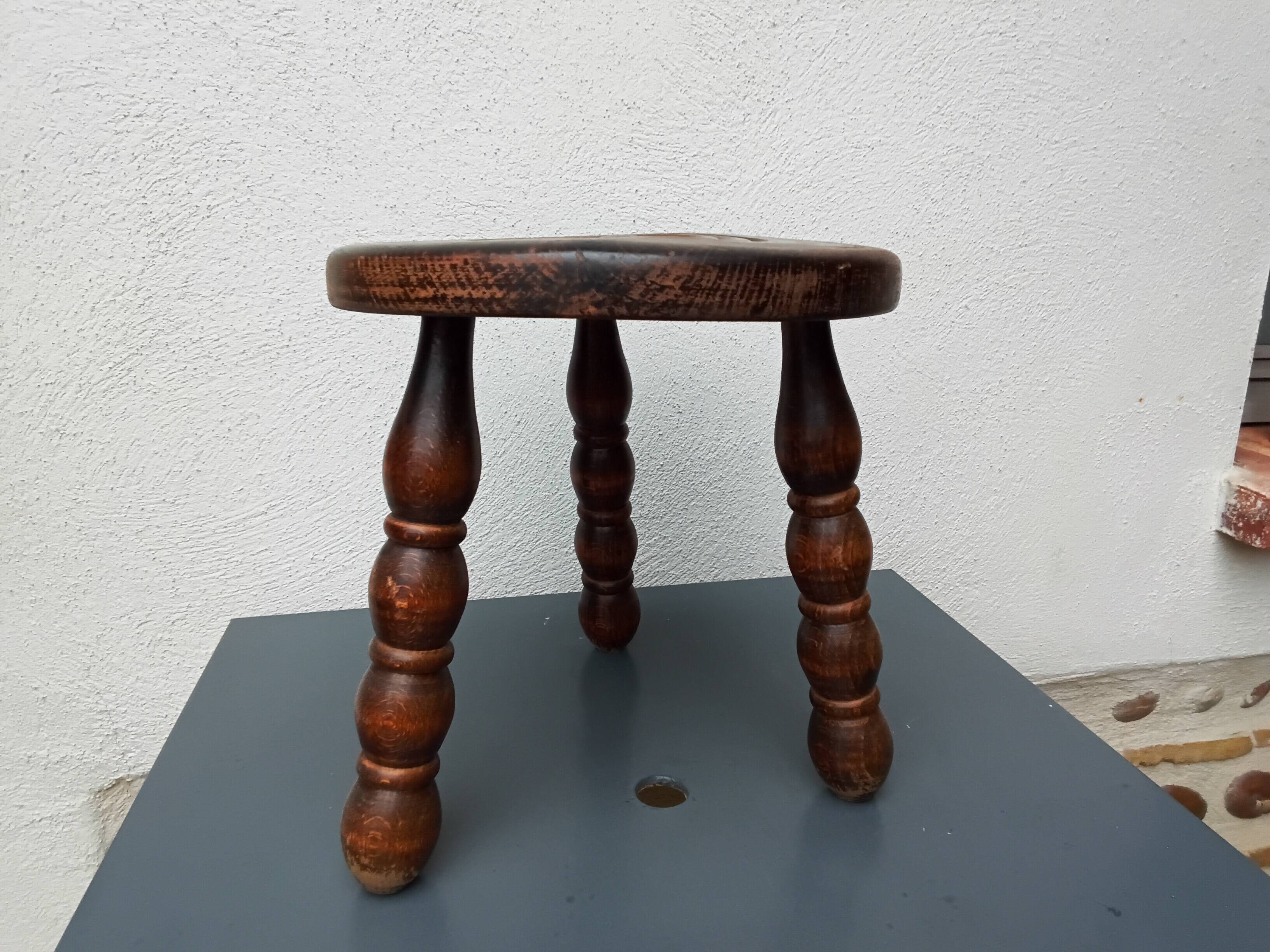 Wooden tripod stool
