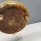 Small ceramic bowl with handle, in golden colours. Danish 1960-70s