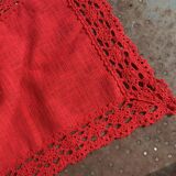 Linen and cotton table runner with vintage red crochet border