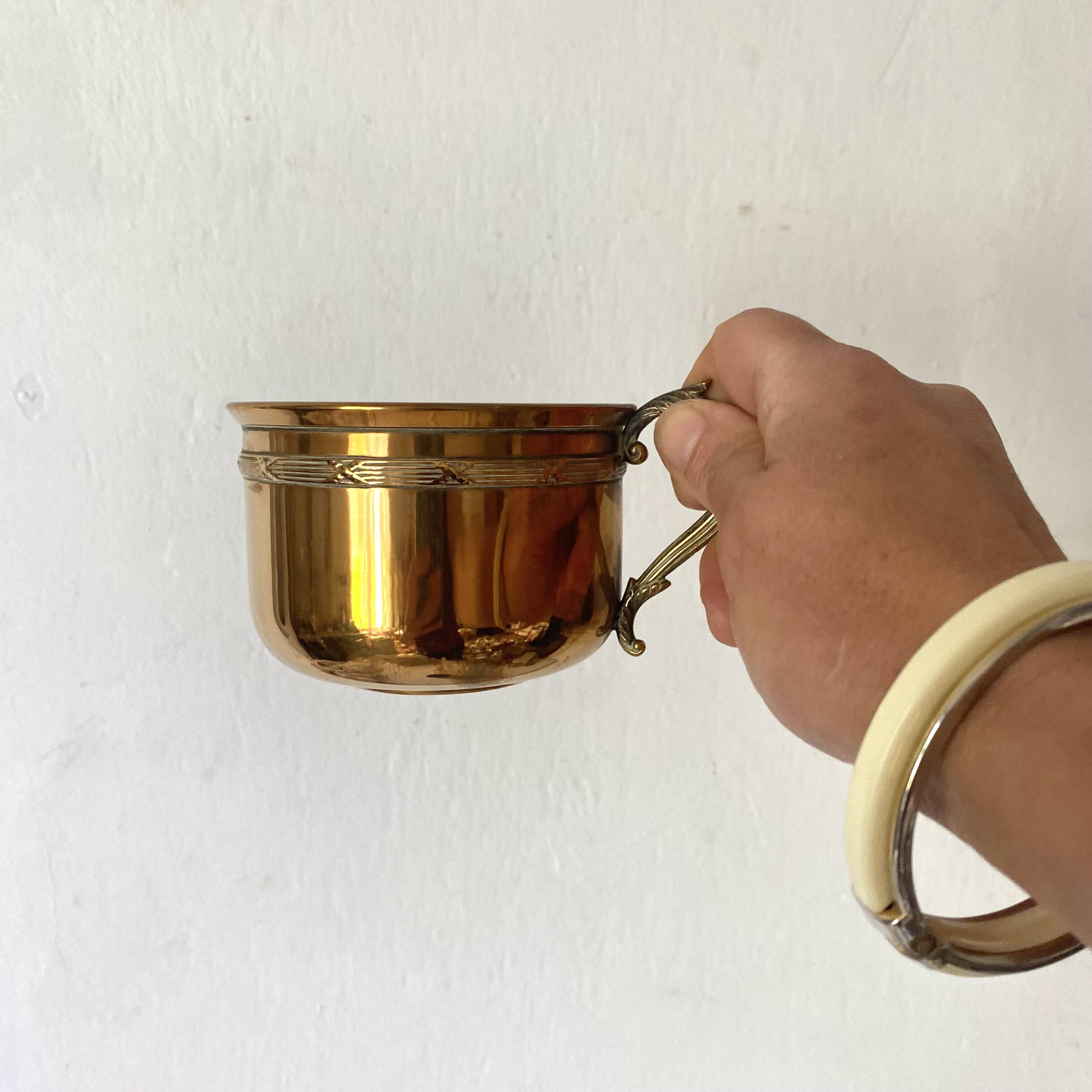 Antique brass cups