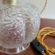 Moulded glass globe walking lamp