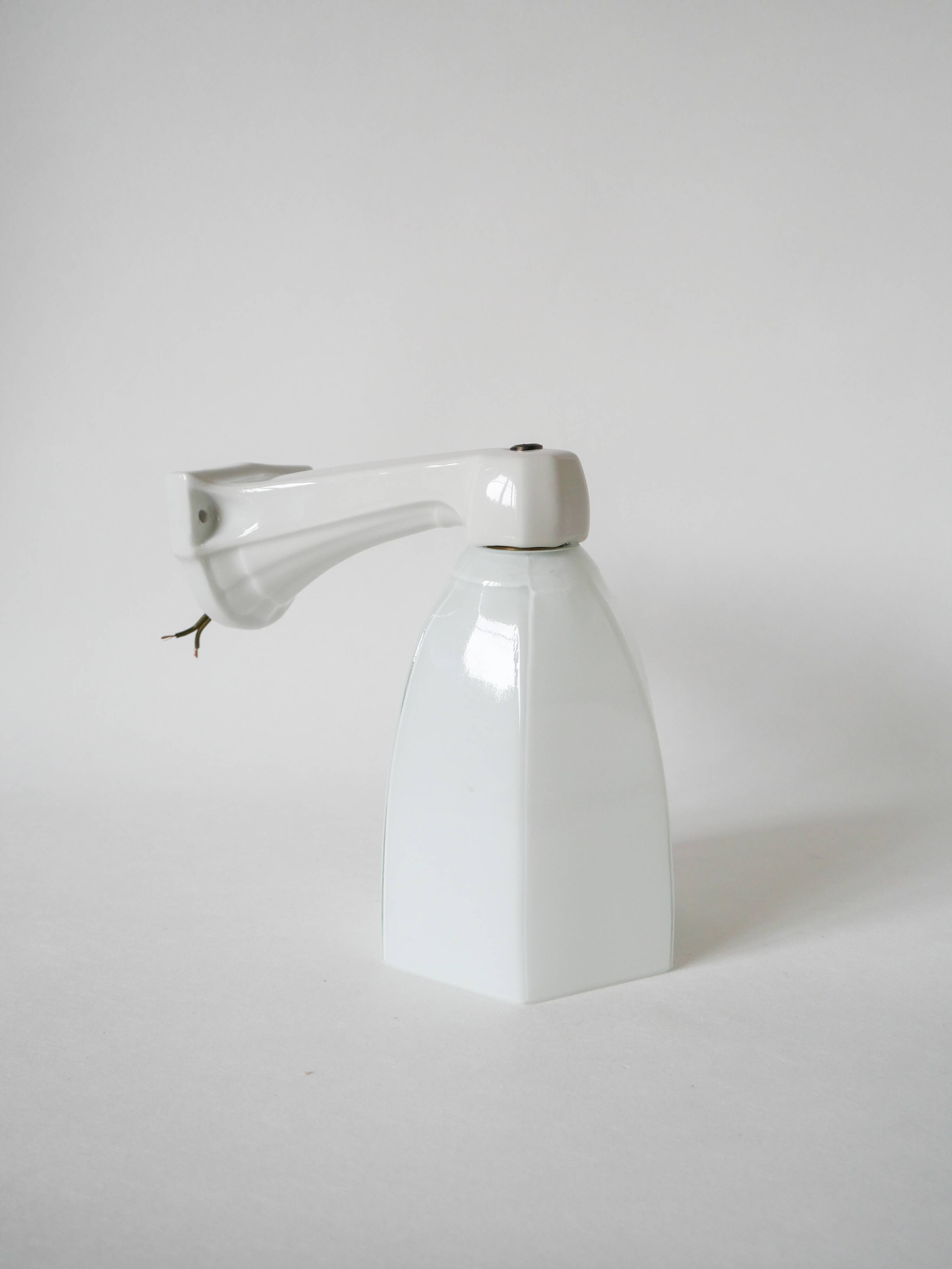 graphic art deco wall light and 20th century porcelain support