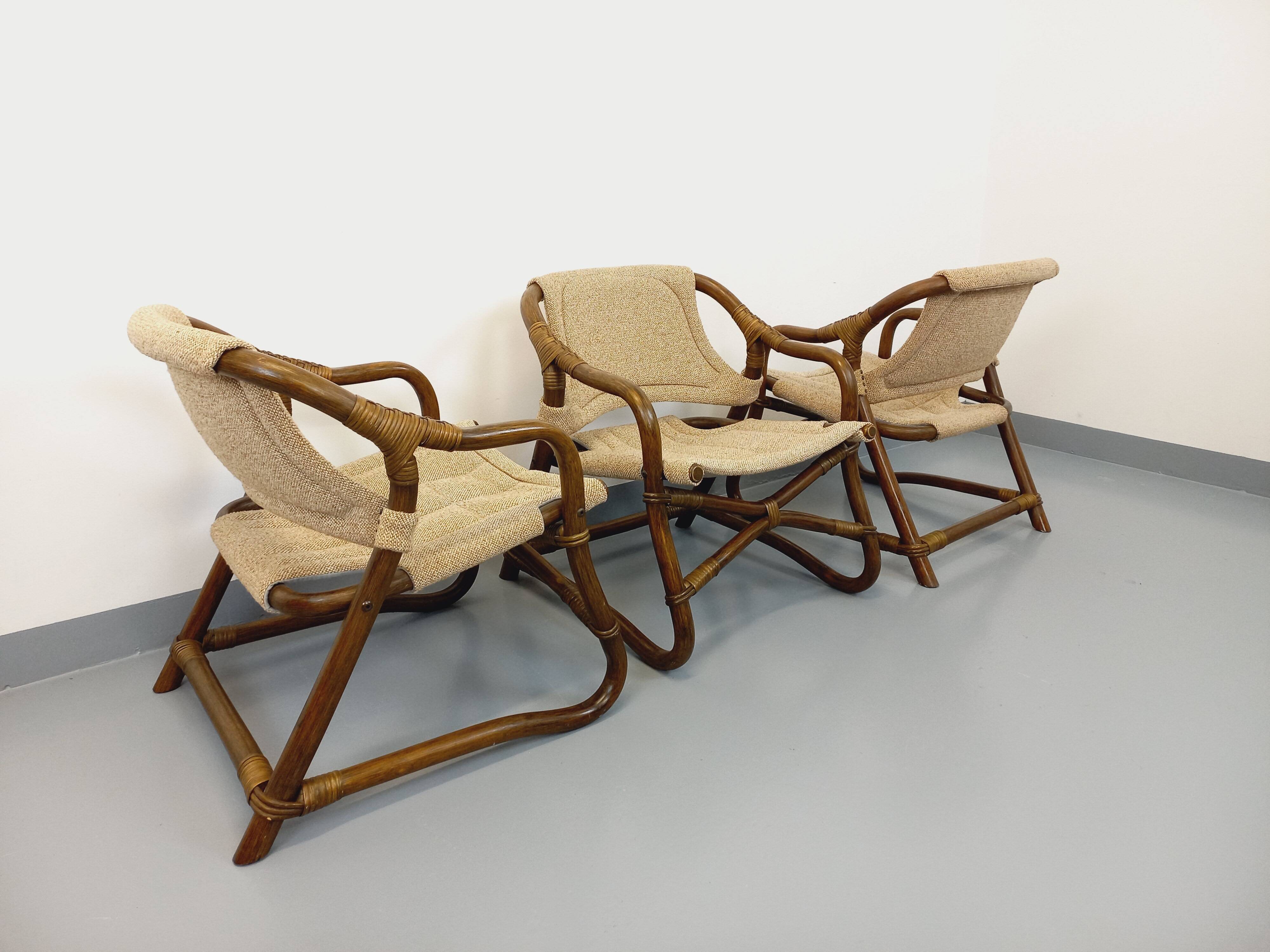 Set of 3 vintage Danish safari-style armchairs from Horsnæs Møbelfabrik in rattan and fabric from the 1980s.