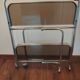 Vintage iron and smoked glass serving trolley
