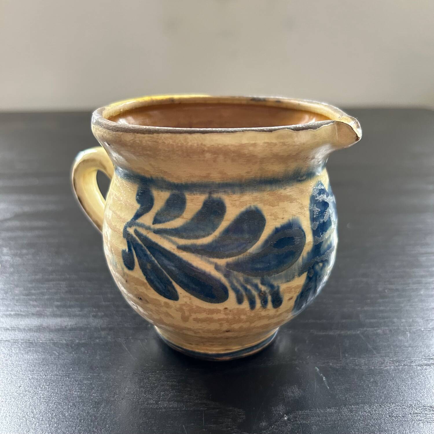 Pitcher with blue floral decor