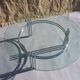 Chrome and glass tripod coffee table