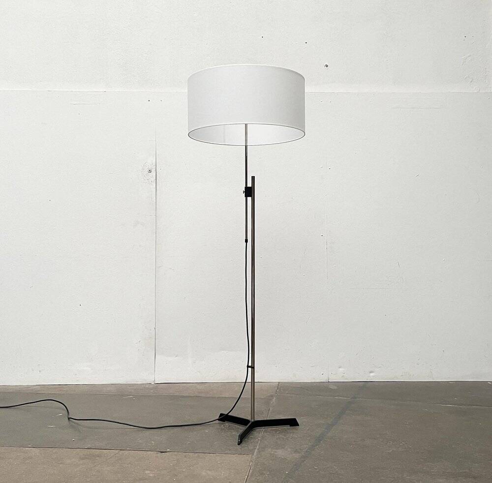 Mid-century German minimalist tripod floor lamp from the 1960s.