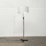Mid-century German minimalist tripod floor lamp from the 1960s.