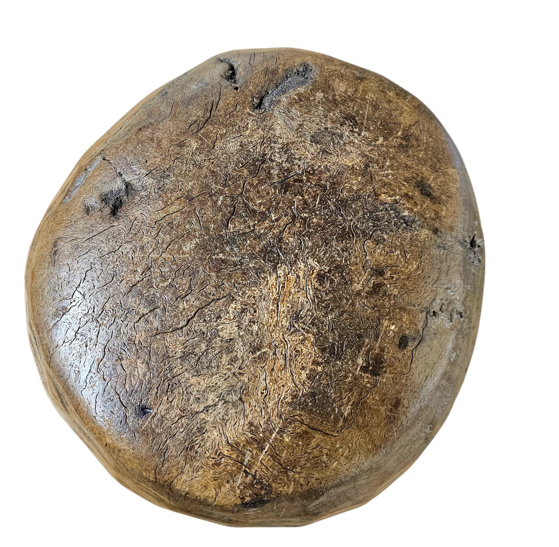 A substantial hand-hewn wooden bowl carved from a single burl section
