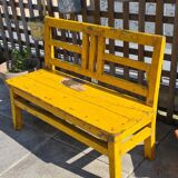 Old yellow teak school bench