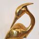 Pair of herons in brass