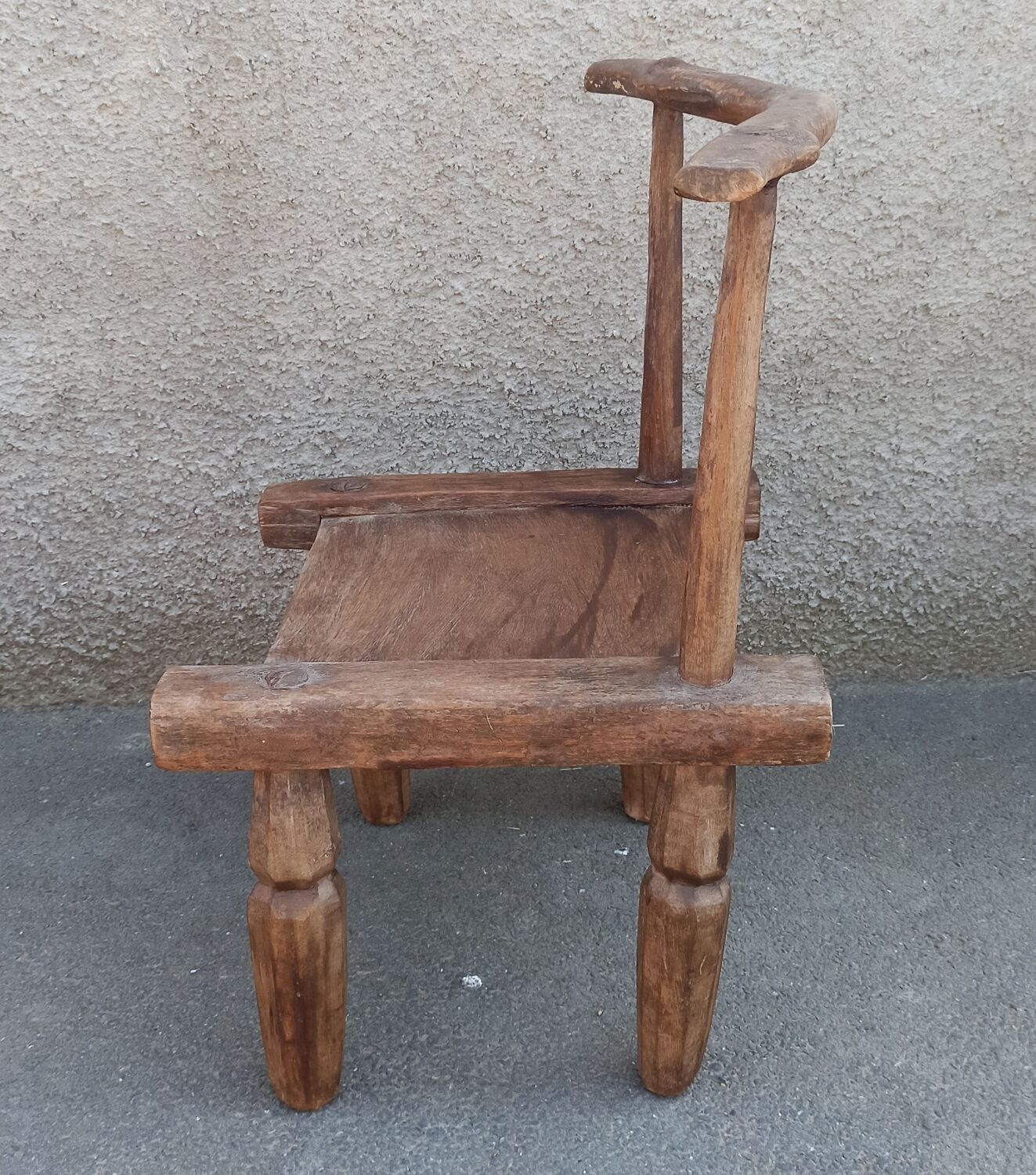 Antique wooden stool. Baoulé African art from Ivory Coast.