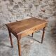Antique French writing table in walnut with a drawer, circa 1900.