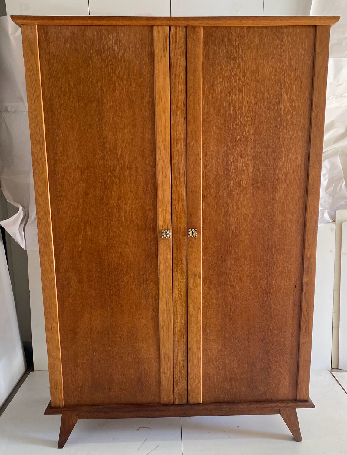 Vintage cupboard with compass feet