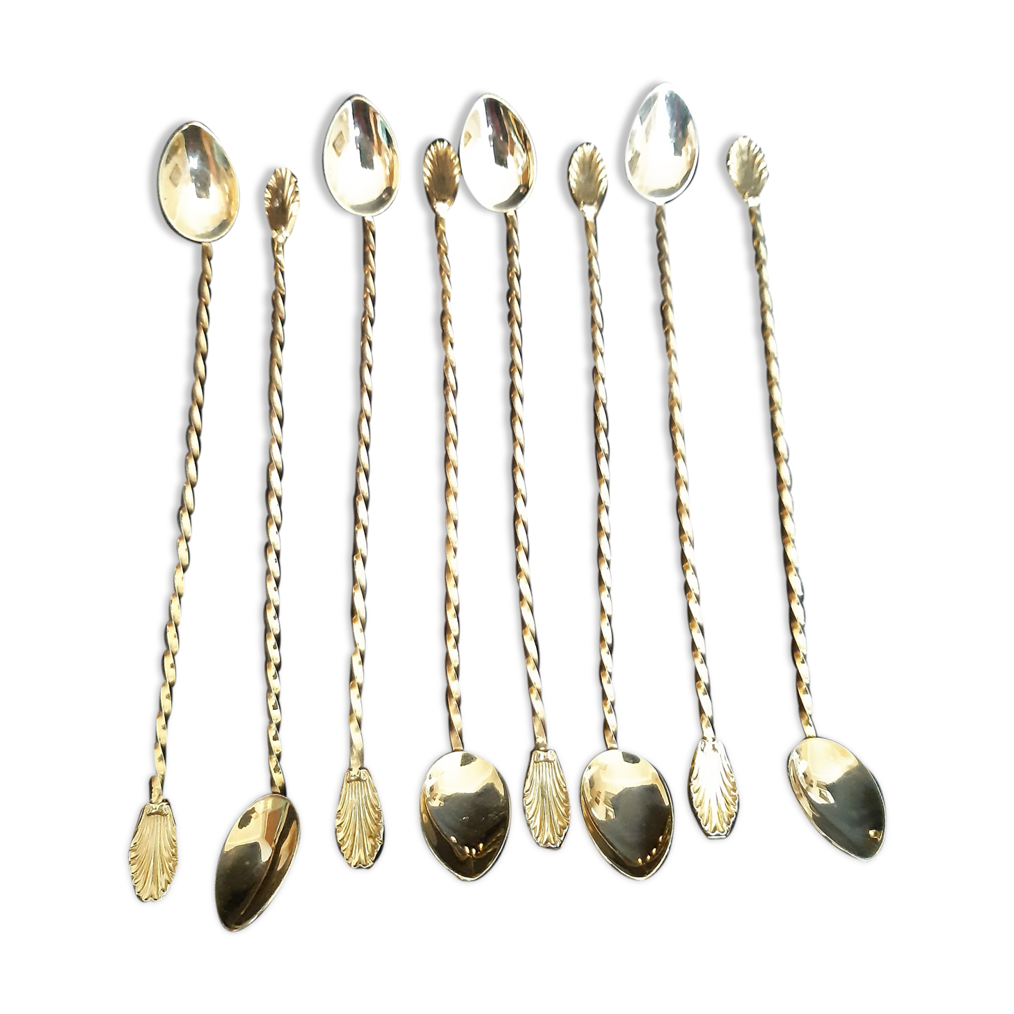 Set of 8 golden cocktail spoons