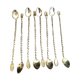 Set of 8 golden cocktail spoons