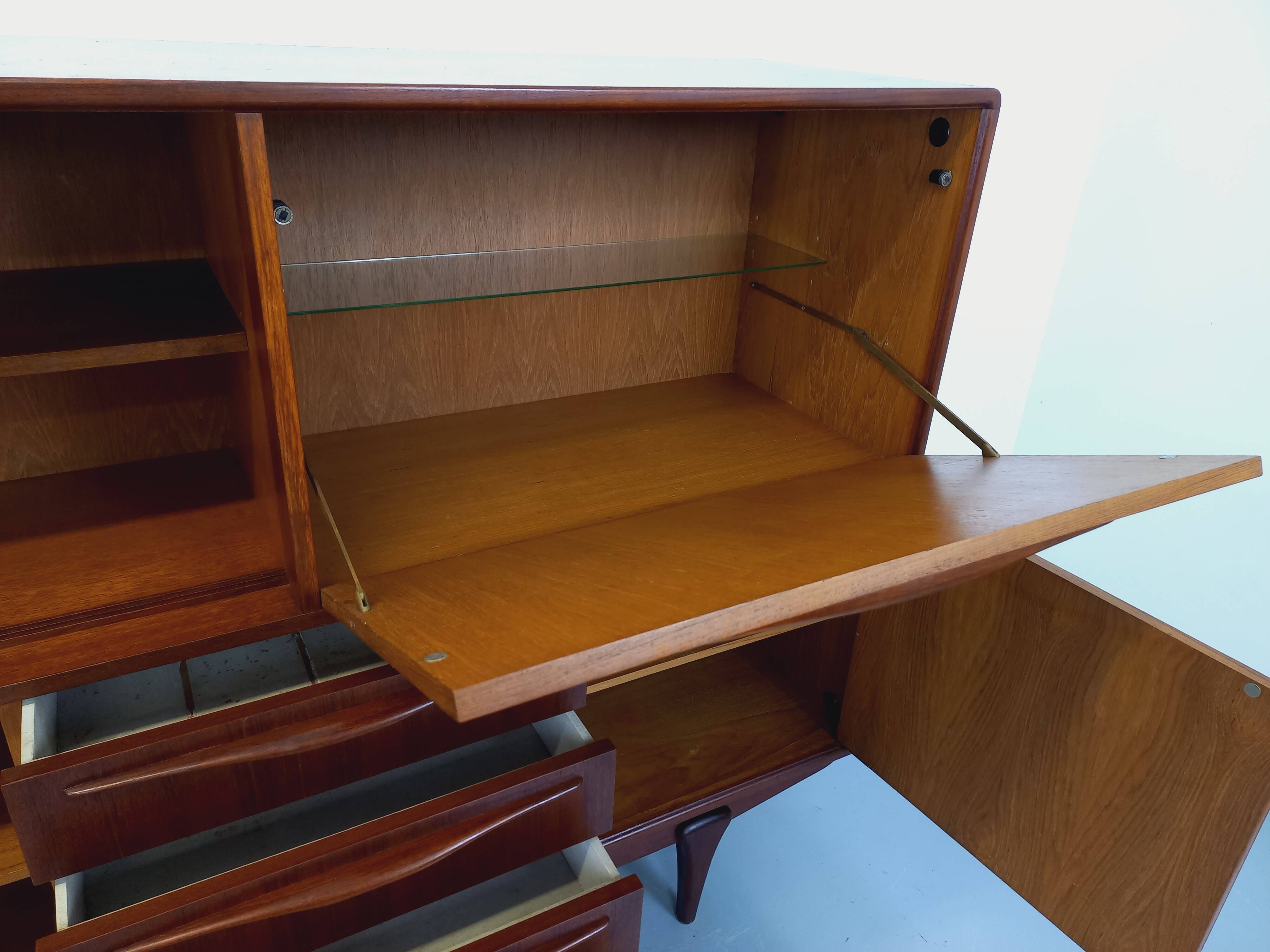 Vintage Scandinavian high sideboard in teak from the 50s and 60s