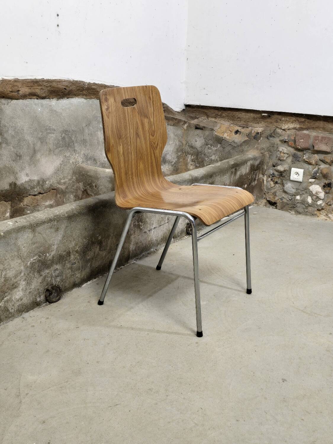 1960s chair in curved plywood on stainless steel base