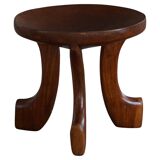 Oromo stool from mid-20th century Africa, hand-carved wood, tribal style.