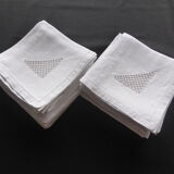 18 antique napkins in white linen with an embroidered geometric decoration