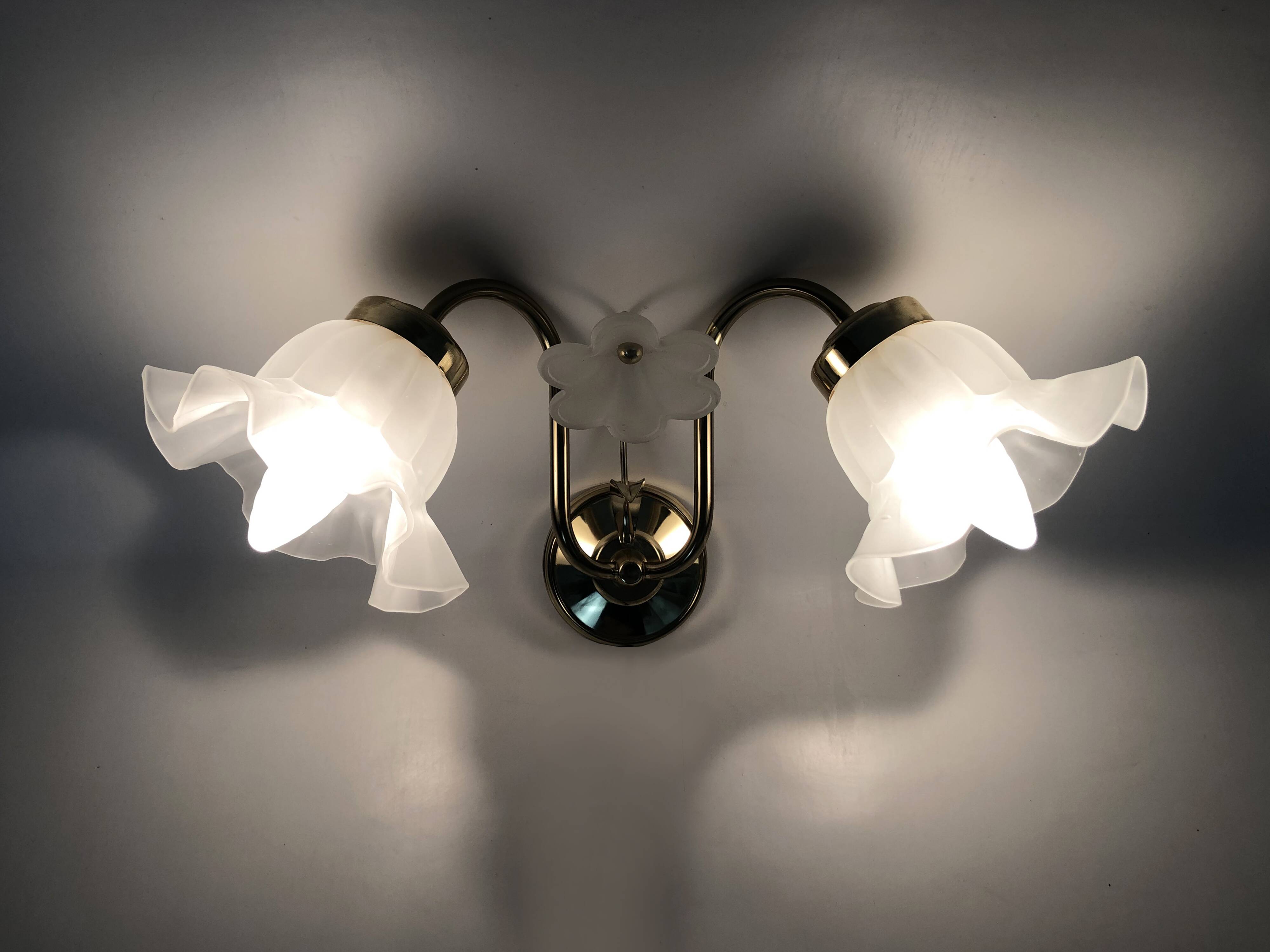 Pair of vintage brass wall lights with flower and glass tulip. 80 years
