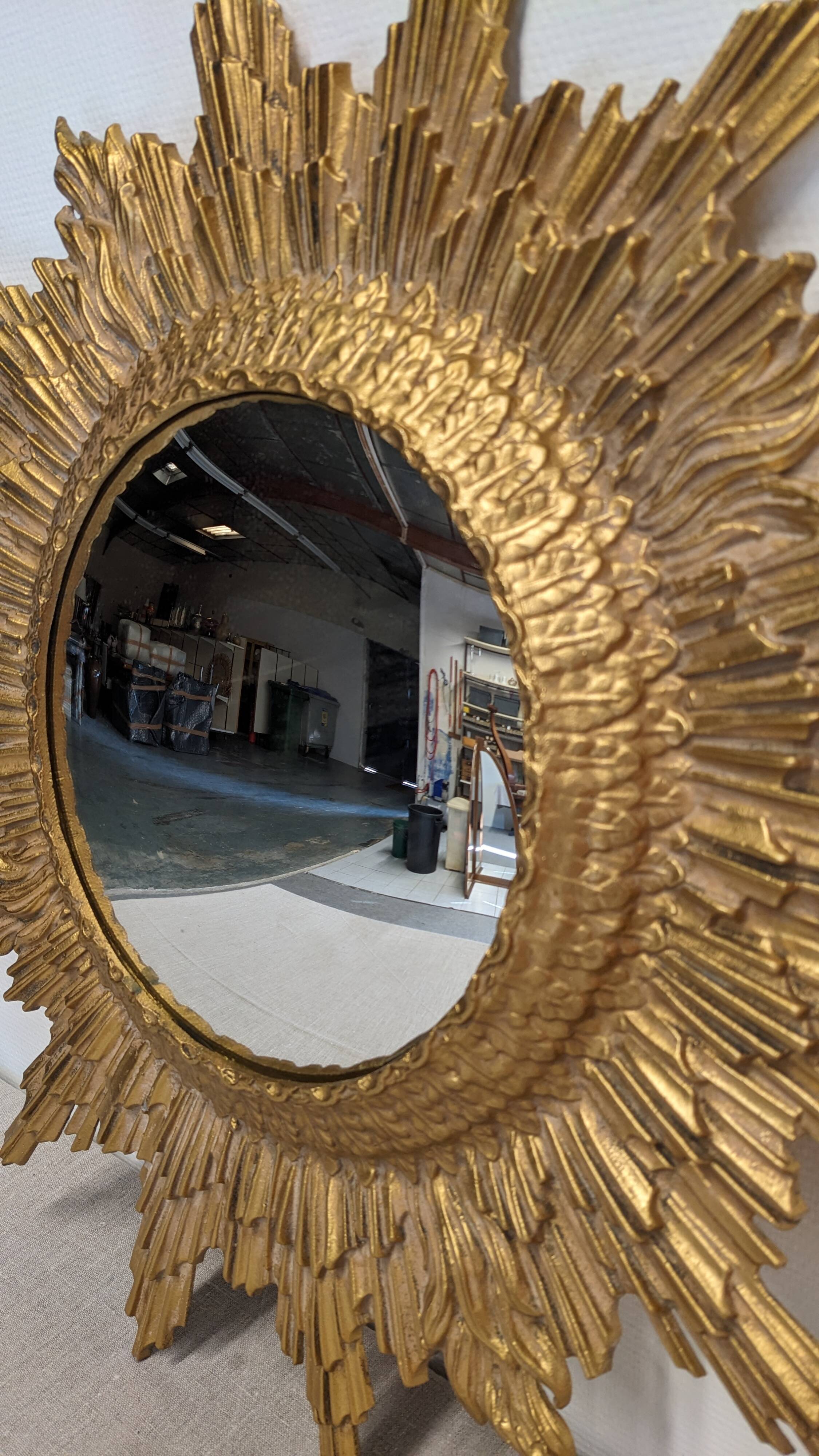 XL witch's eye sun mirror in gilded metal, Italy circa 1970