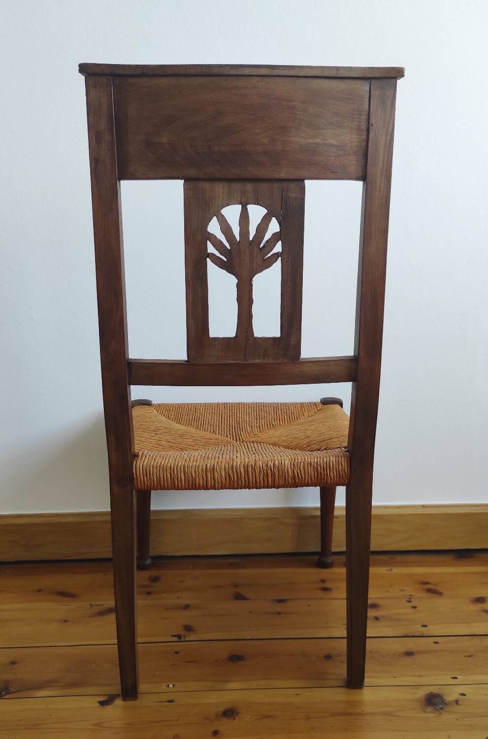 Armchair, low carved chair from the 19th century - decorated with wheat ears.