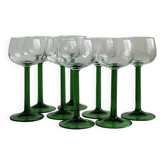 8 Alsatian stemmed glasses, transparent glass and green stems.