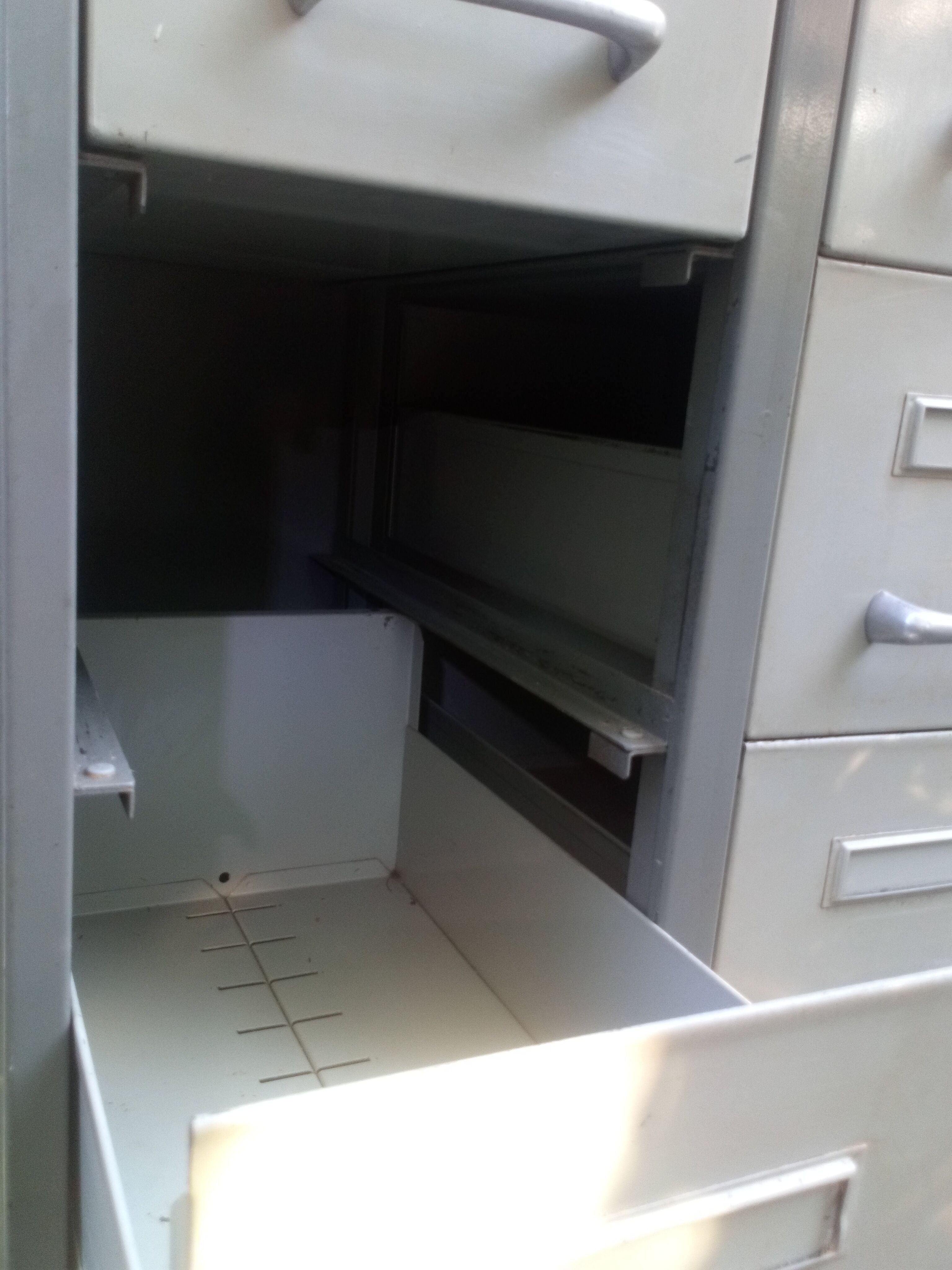 Industrial furniture with drawers on feet 1950