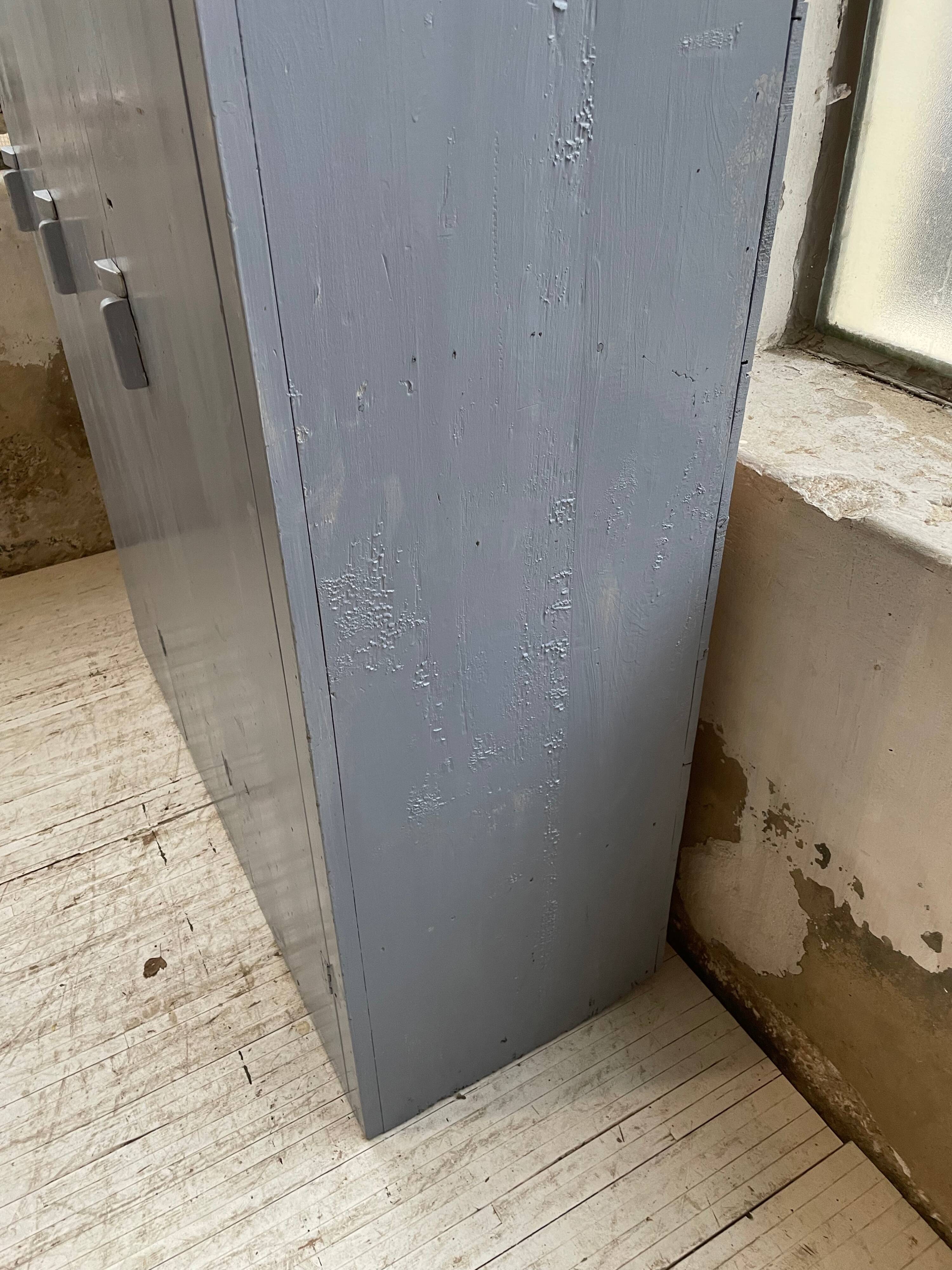 Blue patinated workshop furniture locker room