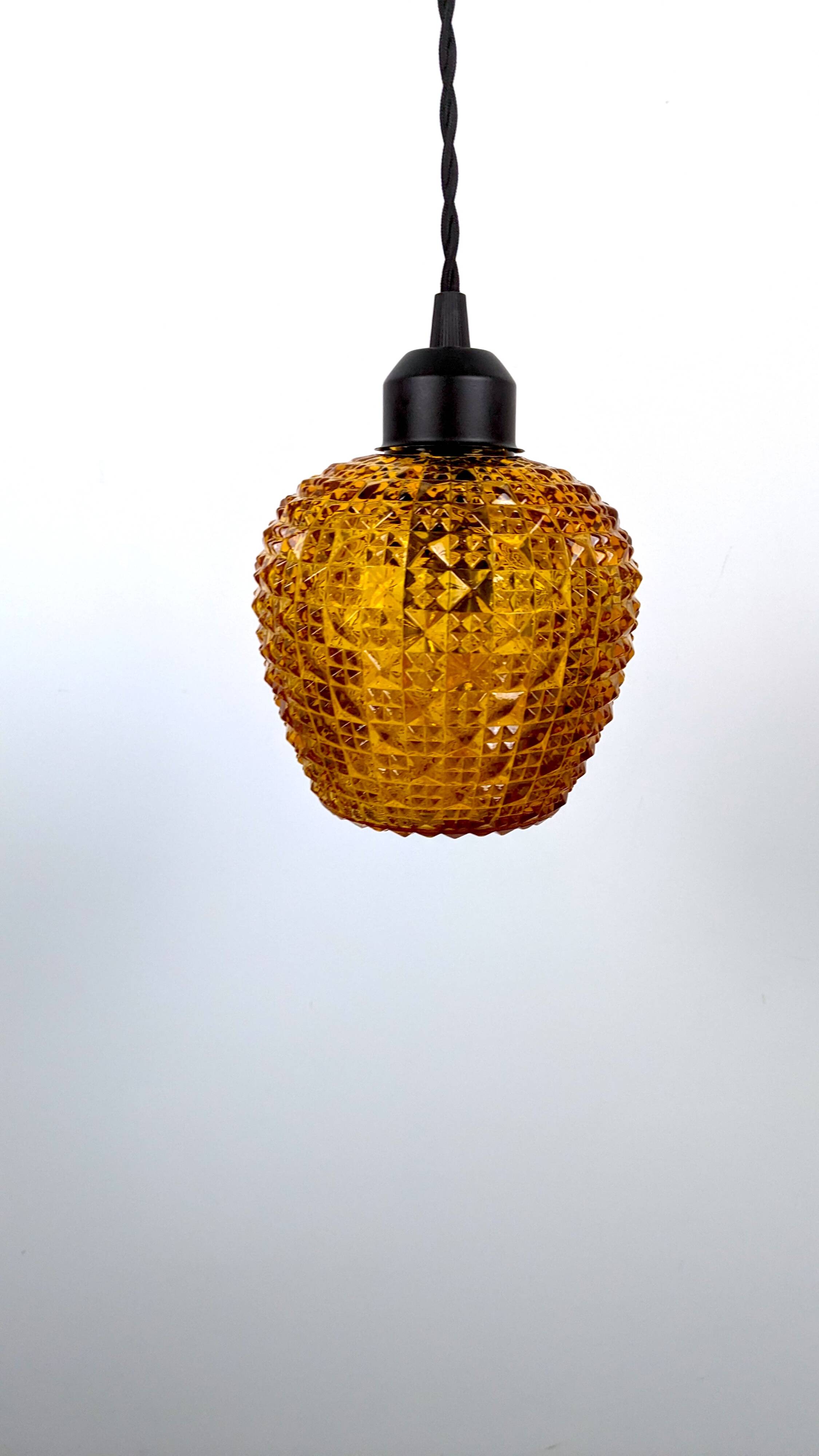 Vintage pendant light in ocher chiseled glass