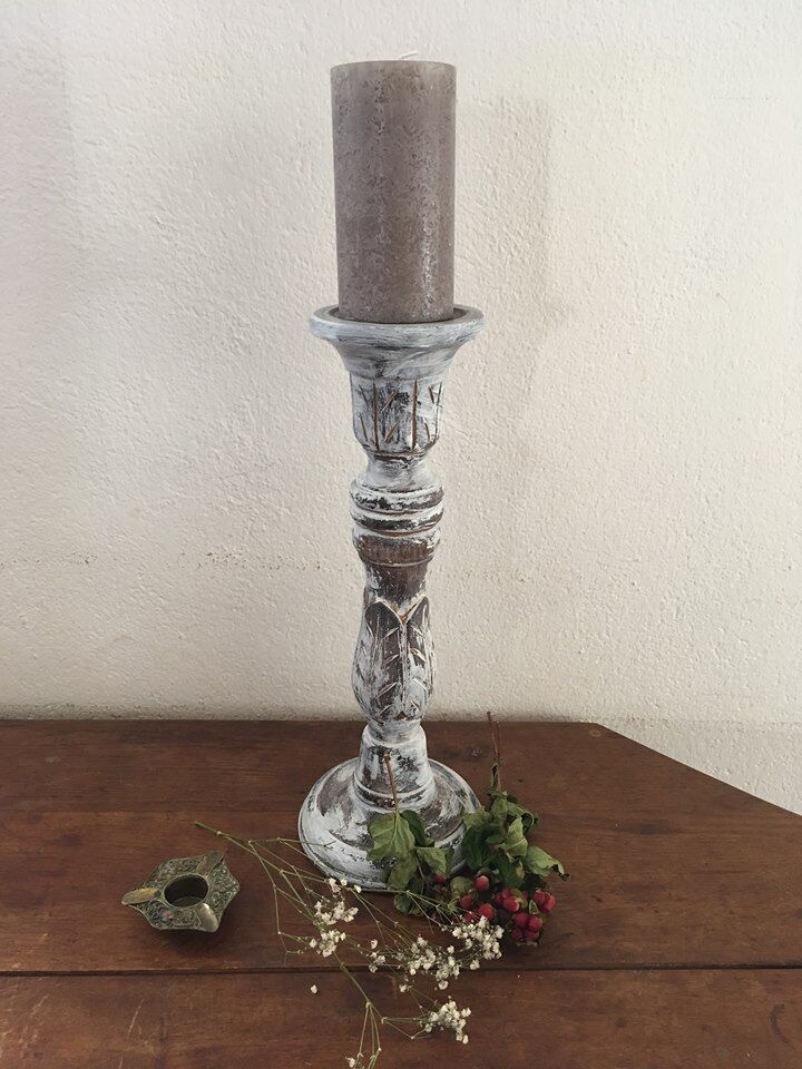 Large candlestick in white patinated wood.
