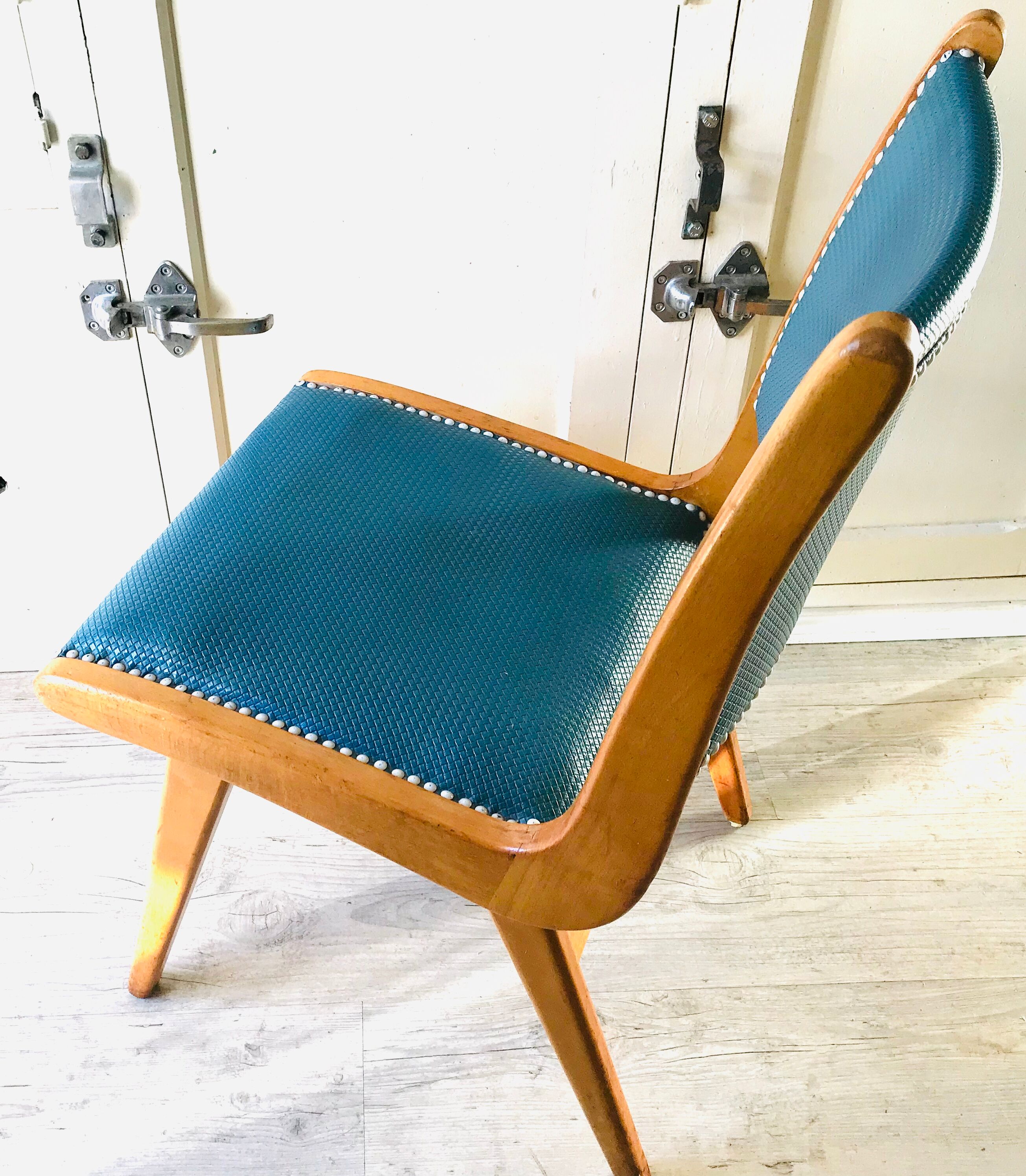 Vintage compass foot chair and studded blue skai