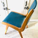 Vintage compass foot chair and studded blue skai