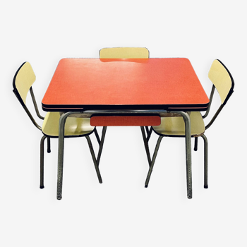 Red Formica table and vintage yellow chairs