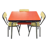 Red Formica table and vintage yellow chairs