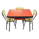 Red Formica table and vintage yellow chairs