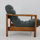 1960s pair of armchairs with stools in oak, Finland