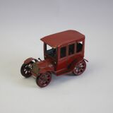 Vintage tin car with pull lever