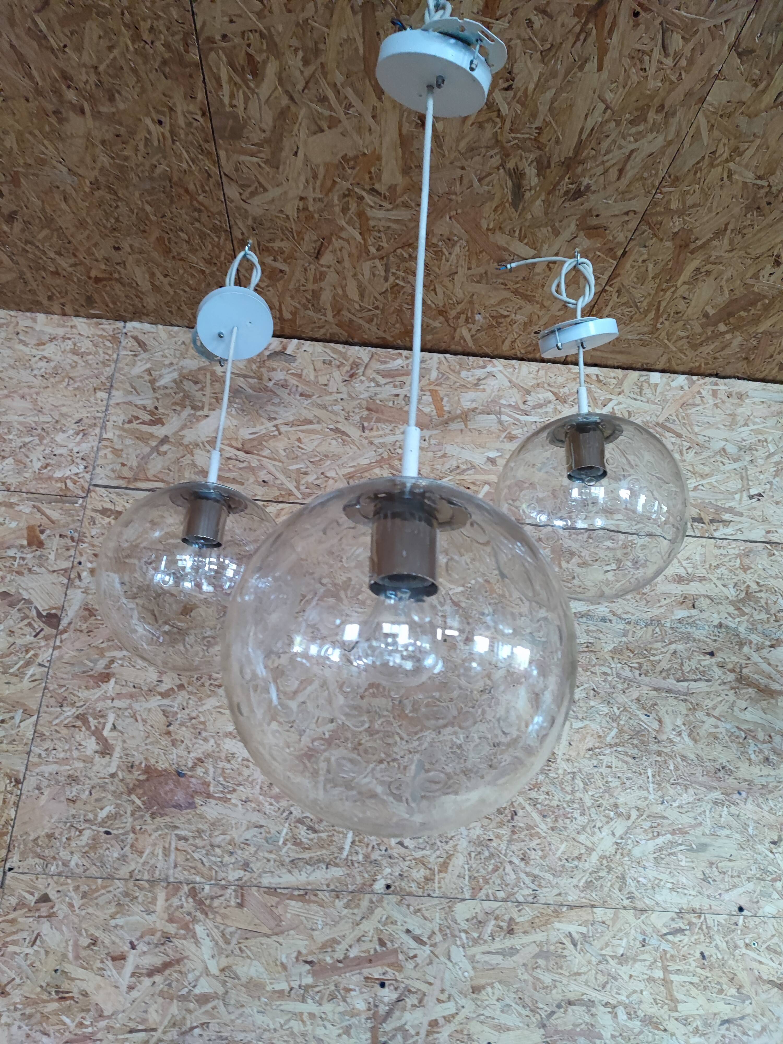 Bubbled glass globe pendant light. RAAK Amsterdam