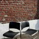 Set of 6 black metal chairs, model GF 40/4 by David Rowland.