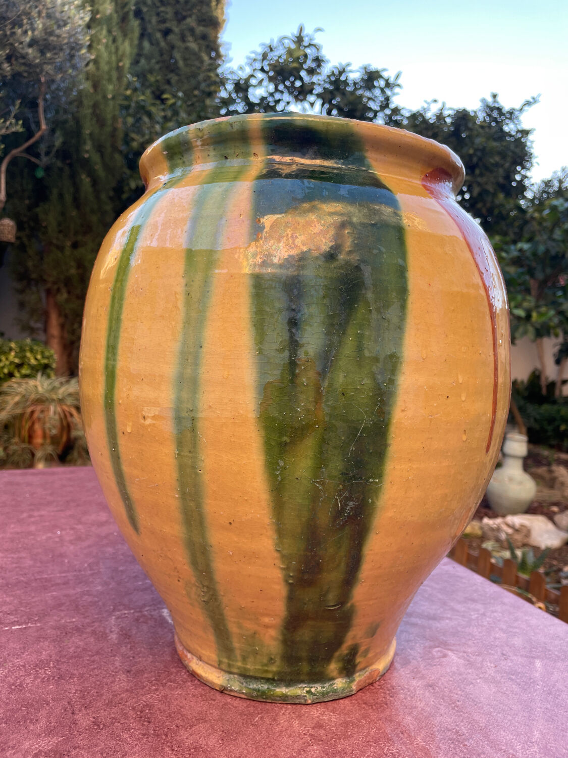 Old glazed terracotta jar