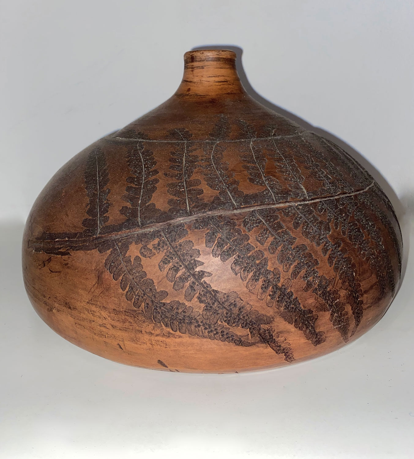 Terracotta vases with plant print