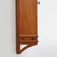 Art Deco oak wall cabinet with amber glazed door, Belgium ca. 1925