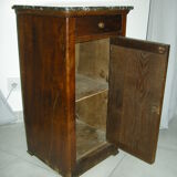 Walnut bedside table on marble